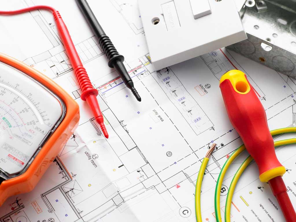 Electrical installation drawings with a multimeter, test leads, a switch box and earth cable